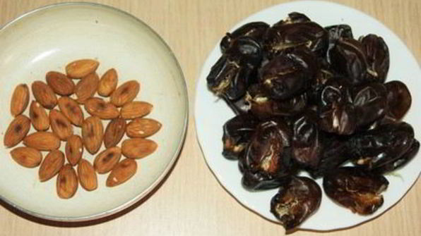 натуральные конфеты финики с миндалем в шоколаде