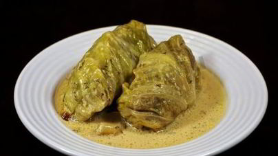 Голубцы в сметанном соусе в духовке