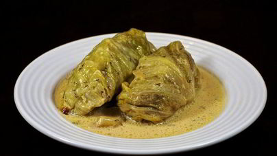 Запеченные голубцы в сметанном соусе