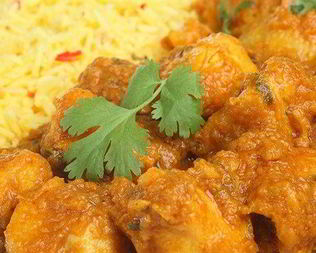 Курица в сливочном соусе карри с ананасом