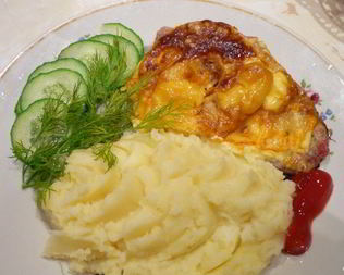 Свинина под сыром в духовке