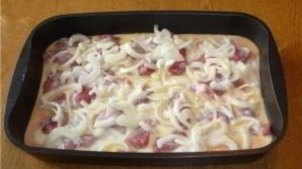 свинина, запеченная с овощами под соусом бешамель