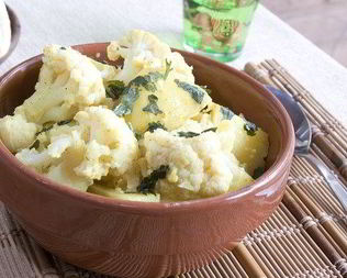 Цветная капуста со сливочным маслом и петрушкой