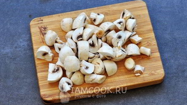 тушеные кальмары с овощами