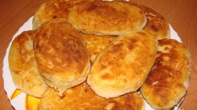 Пирожки с капустой и яйцом жареные