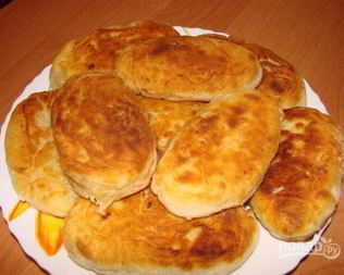 Пирожки с капустой и яйцом жареные