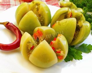 Квашеные зеленые помидоры в кастрюле