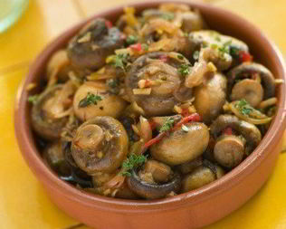 Маринованные шампиньоны в оливковом масле с эстрагоном и петрушкой